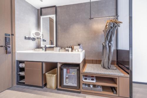 Imagen de la habitación del Hotel Atour Emeishan Railway Station Exiu Lake. Foto 18