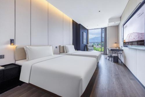 Imagen general del Hotel Atour Emeishan Railway Station Exiu Lake. Foto 5