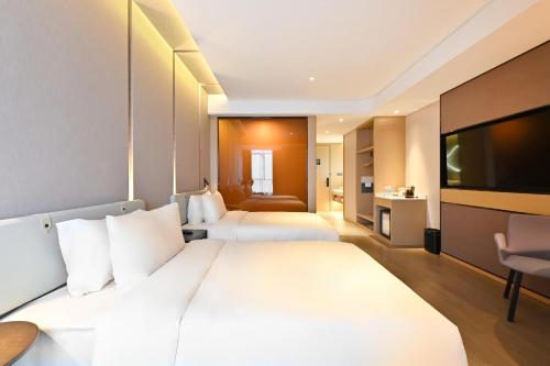 Imagen de la habitación del Hotel Atour Fuzhou Diamond Plaza. Foto 12