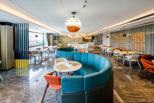Imagen del bar/restaurante del Hotel Atour Guangzhou Huadu Financial Center. Foto 9
