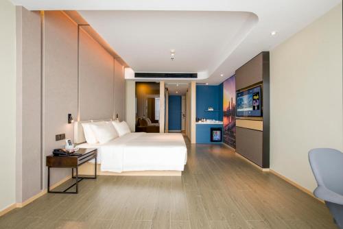 Imagen de la habitación del Hotel Atour Guangzhou Huadu Financial Center. Foto 12