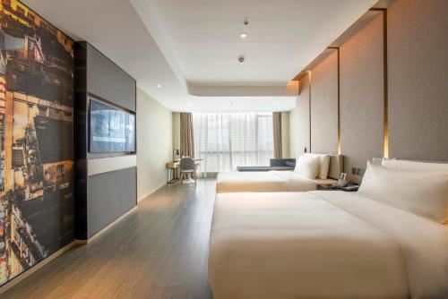 Imagen de la habitación del Hotel Atour Guangzhou Huadu Financial Center. Foto 13