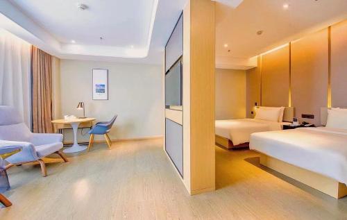 Imagen de la habitación del Hotel Atour Guangzhou Huadu Financial Center. Foto 19