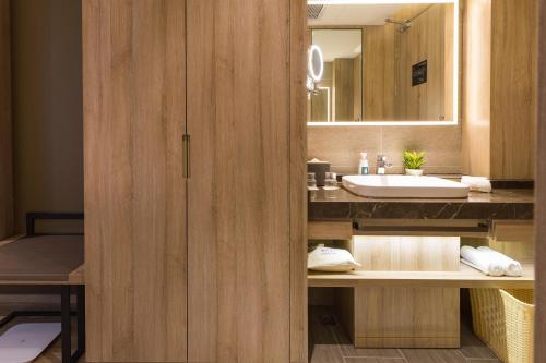 Imagen de la habitación del Hotel Atour Guangzhou Huadu Square. Foto 11