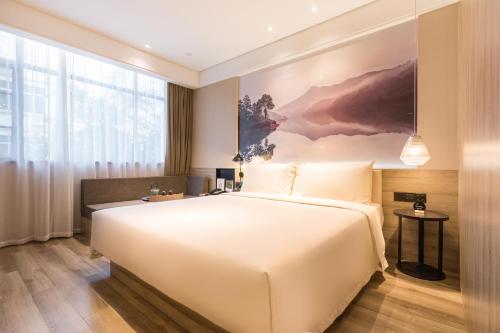 Imagen de la habitación del Hotel Atour Guangzhou Huadu Square. Foto 12