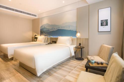 Imagen de la habitación del Hotel Atour Guangzhou Huadu Square. Foto 14