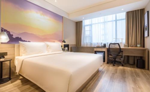 Imagen de la habitación del Hotel Atour Guangzhou Huadu Square. Foto 15