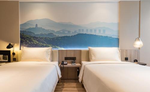 Imagen de la habitación del Hotel Atour Guangzhou Huadu Square. Foto 16