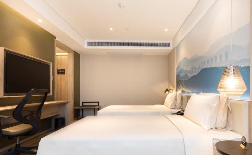 Imagen de la habitación del Hotel Atour Guangzhou Huadu Square. Foto 17