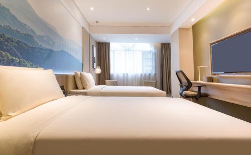 Imagen de la habitación del Hotel Atour Guangzhou Huadu Square. Foto 20