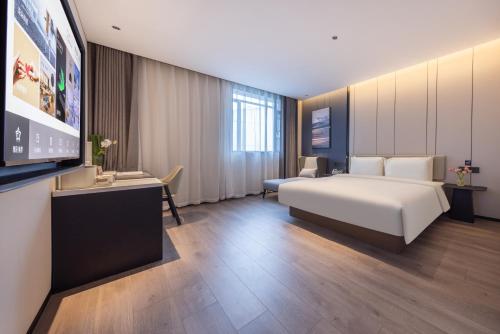 Imagen de la habitación del Hotel Atour Guangzhou Panyu Wanbo CBD Hanxi Changlong. Foto 7