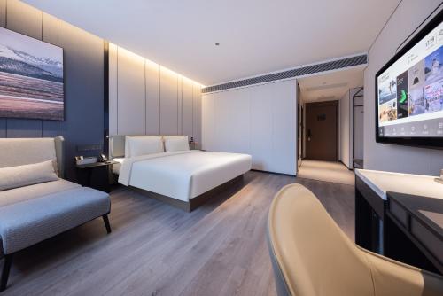 Imagen de la habitación del Hotel Atour Guangzhou Panyu Wanbo CBD Hanxi Changlong. Foto 9