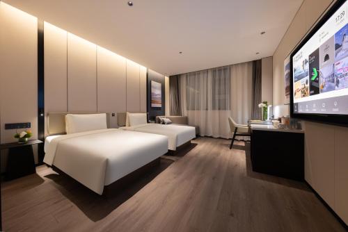 Imagen de la habitación del Hotel Atour Guangzhou Panyu Wanbo CBD Hanxi Changlong. Foto 10