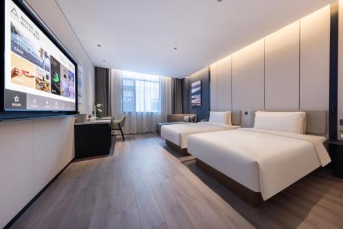 Imagen de la habitación del Hotel Atour Guangzhou Panyu Wanbo CBD Hanxi Changlong. Foto 12