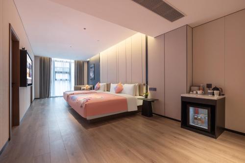 Imagen de la habitación del Hotel Atour Guangzhou Panyu Wanbo CBD Hanxi Changlong. Foto 16