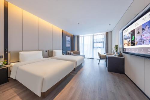 Imagen de la habitación del Hotel Atour Guangzhou Panyu Wanbo CBD Hanxi Changlong. Foto 17
