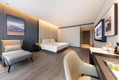 Imagen de la habitación del Hotel Atour Guangzhou Panyu Wanbo CBD Hanxi Changlong. Foto 18