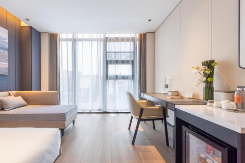 Imagen de la habitación del Hotel Atour Guangzhou Panyu Wanbo CBD Hanxi Changlong. Foto 19