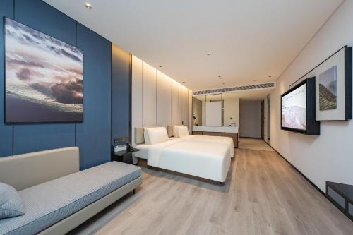 Imagen de la habitación del Hotel Atour Guangzhou Pazhou Convention and Exhibition Center Information Port. Foto 11