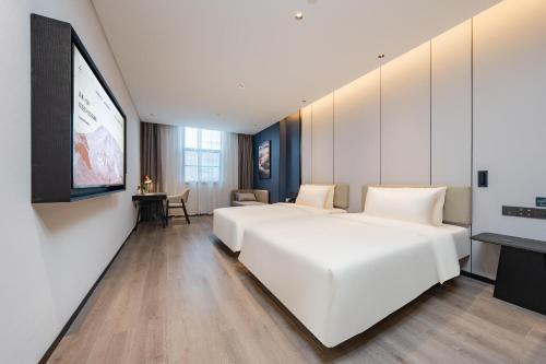 Imagen de la habitación del Hotel Atour Guangzhou Pazhou Convention and Exhibition Center Information Port. Foto 12