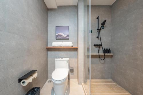 Imagen de la habitación del Hotel Atour Guangzhou Pazhou Convention and Exhibition Center Information Port. Foto 13