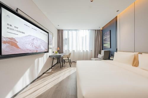 Imagen de la habitación del Hotel Atour Guangzhou Pazhou Convention and Exhibition Center Information Port. Foto 15