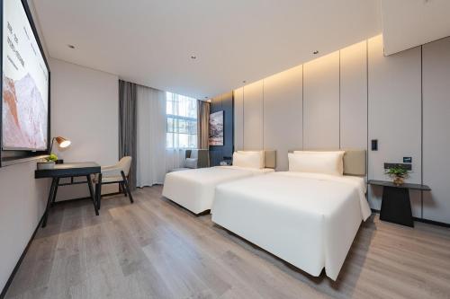 Imagen de la habitación del Hotel Atour Guangzhou Pazhou Convention and Exhibition Center Information Port. Foto 20