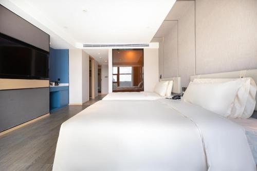 Imagen de la habitación del Hotel Atour Guiyang Guanshan Lake Park. Foto 17