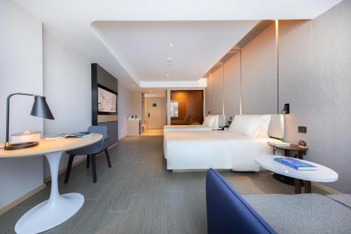 Imagen de la habitación del Hotel Atour Haikou East High-Speed Railway Station Xueyuan Road. Foto 13