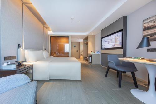 Imagen de la habitación del Hotel Atour Haikou East High-Speed Railway Station Xueyuan Road. Foto 14