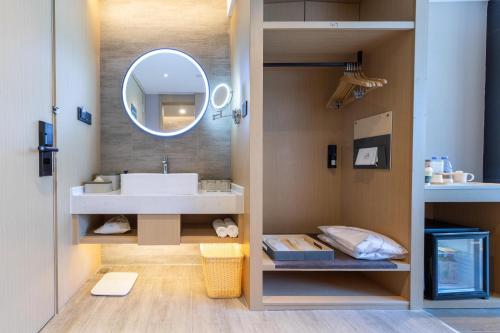 Imagen de la habitación del Hotel Atour Haikou East High-Speed Railway Station Xueyuan Road. Foto 15