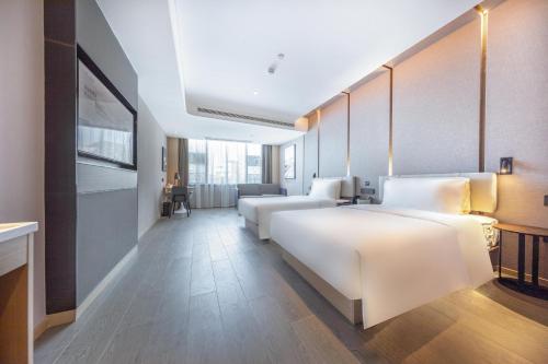 Imagen de la habitación del Hotel Atour Haikou East High-Speed Railway Station Xueyuan Road. Foto 18
