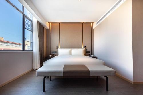 Imagen de la habitación del Hotel Atour Haikou East High-Speed Railway Station Xueyuan Road. Foto 20