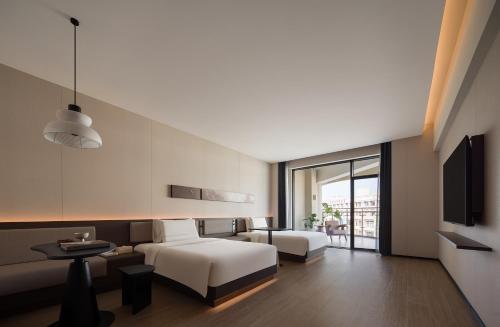 Imagen de la habitación del Hotel Atour Haikou Longhua Jinniuling Park. Foto 4