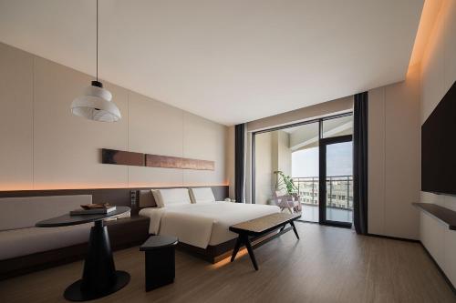 Imagen de la habitación del Hotel Atour Haikou Longhua Jinniuling Park. Foto 7
