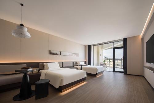 Imagen de la habitación del Hotel Atour Haikou Longhua Jinniuling Park. Foto 13