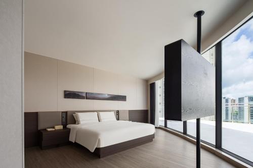 Imagen de la habitación del Hotel Atour Haikou Longhua Jinniuling Park. Foto 14
