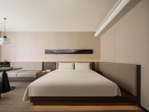 Imagen de la habitación del Hotel Atour Haikou Longhua Jinniuling Park. Foto 15