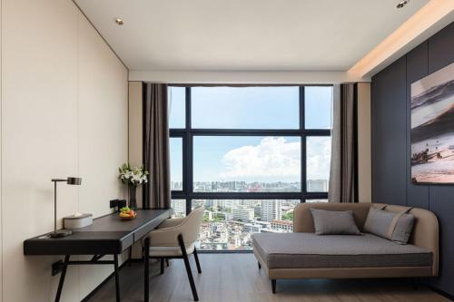 Imagen de la habitación del Hotel Atour Haikou Wanguo Metropolis Qilou Old Street. Foto 12