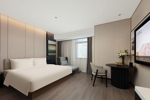 Imagen de la habitación del Hotel Atour Haikou Wanguo Metropolis Qilou Old Street. Foto 13