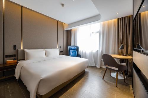 Imagen de la habitación del Hotel Atour Hangzhou Qiandao Lake Central Dock. Foto 14