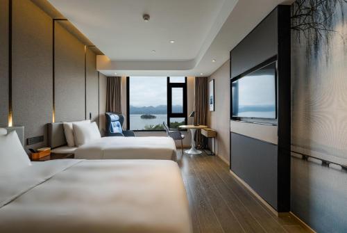 Imagen de la habitación del Hotel Atour Hangzhou Qiandao Lake Central Dock. Foto 15