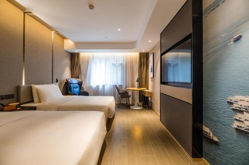 Imagen de la habitación del Hotel Atour Hangzhou Qiandao Lake Central Dock. Foto 19