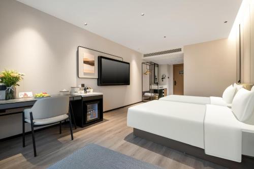 Imagen de la habitación del Hotel Atour Hangzhou Xintiandi Zhongda Intime. Foto 12