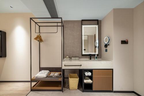 Imagen de la habitación del Hotel Atour Hangzhou Xintiandi Zhongda Intime. Foto 13