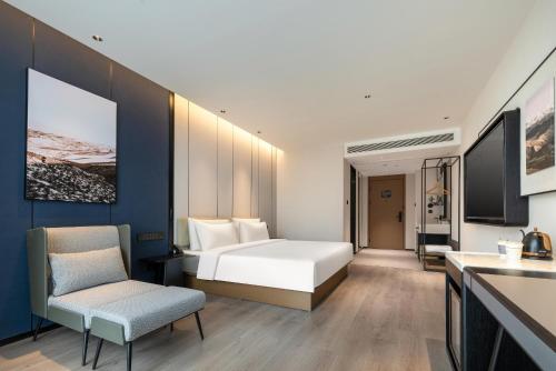 Imagen de la habitación del Hotel Atour Hangzhou Xintiandi Zhongda Intime. Foto 14