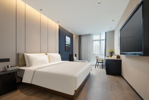 Imagen de la habitación del Hotel Atour Hangzhou Xintiandi Zhongda Intime. Foto 15
