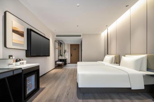 Imagen de la habitación del Hotel Atour Hangzhou Xintiandi Zhongda Intime. Foto 19