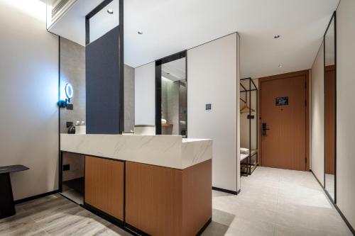 Imagen de la habitación del Hotel Atour Hangzhou Zhejiang University Xilianqiao. Foto 13