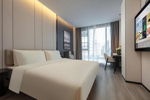 Imagen de la habitación del Hotel Atour Hangzhou Zhejiang University Xilianqiao. Foto 16